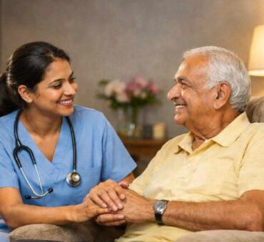 Professional caregiver providing home care services Bangalore to an elderly patient.