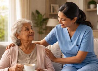 Caregiver assisting elderly dementia patient at home in a comfortable living room.